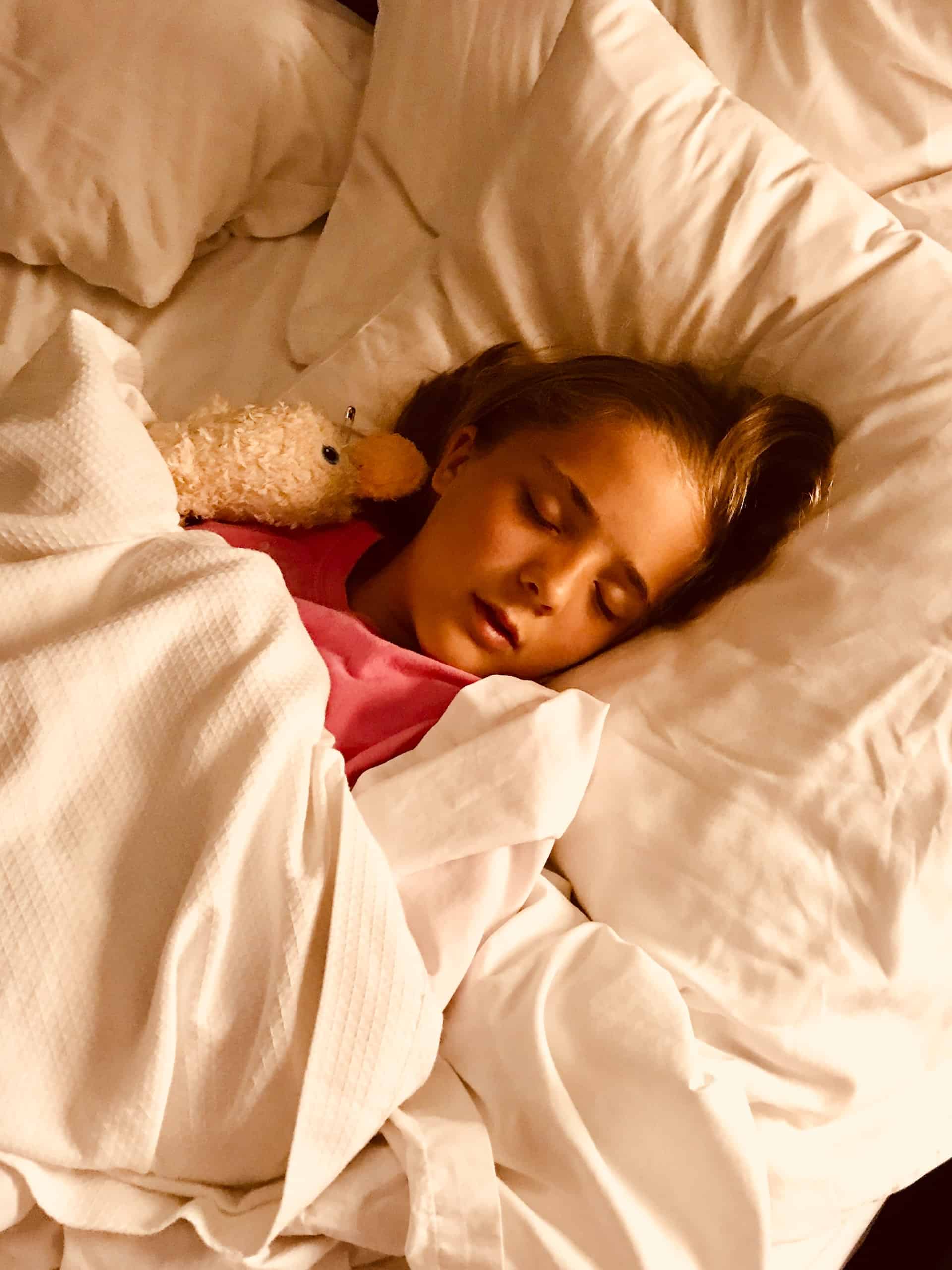 Sleeping Child in Bed