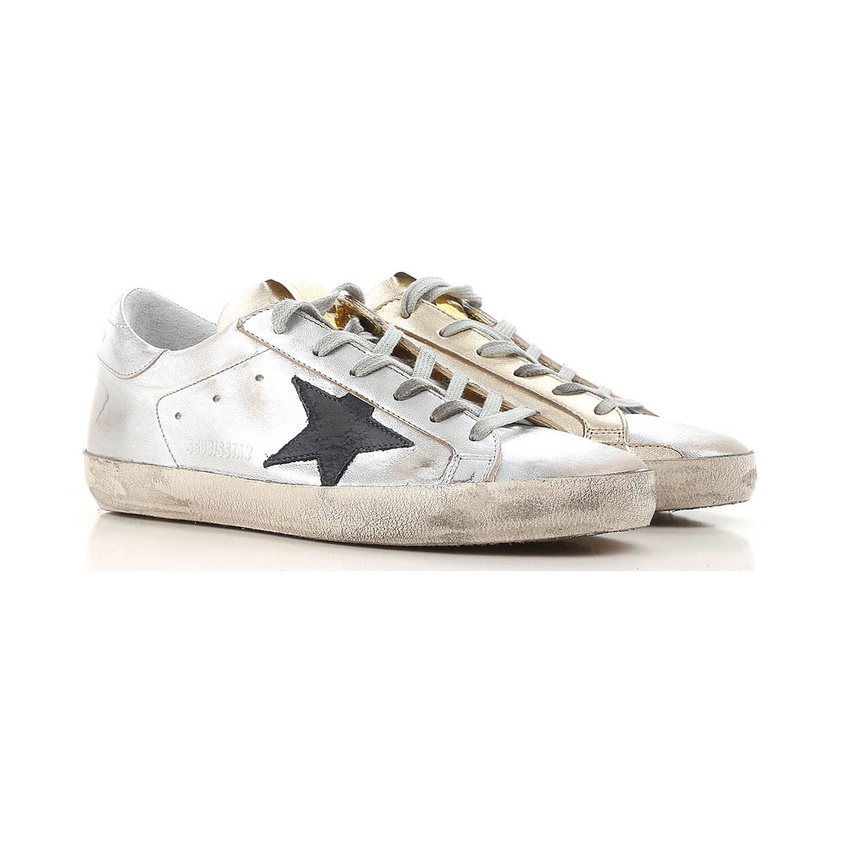 gold and silver golden goose sneakers