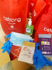 BStrong care package featuring Ultima Replenisher Electrolyte Hydration powder