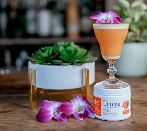 Ultima Tropical French 75 + — Ultima Sour Orange Replenisher Cocktails