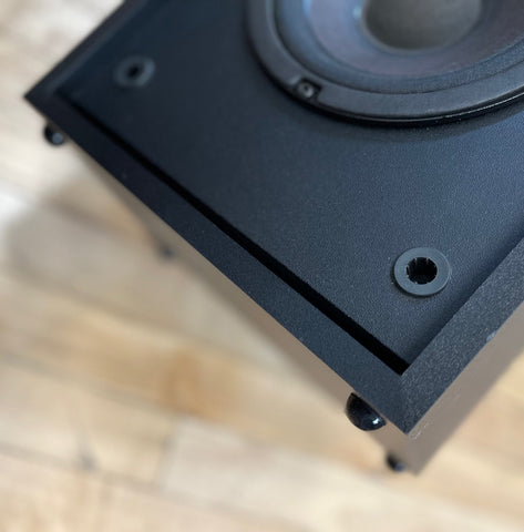 Where can I buy stick on pads for vibrations from my apartment speakers?