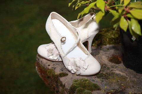 Emily in cream wedding shoes