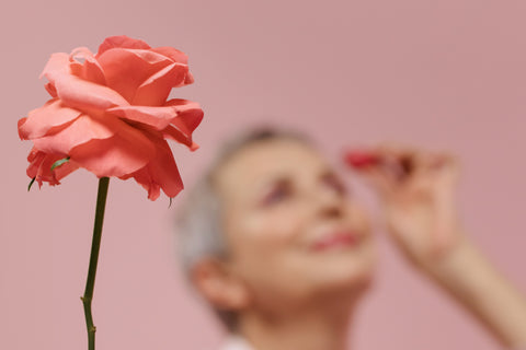 Elderly woman flowers