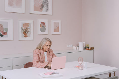 Modern elderly woman computer