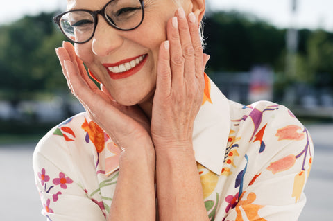 elderly woman glasses smile