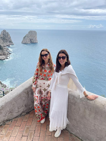 Founders of soru Jewellery Marianna Doyle and Francesca Kelly in Augustus Gardens with views of La Faraglioni rocks 