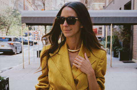 Arielle Charnas wears Soru X Something Navy Gold snake Necklace 