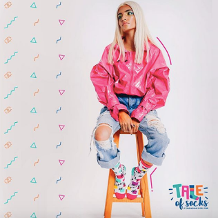 model wears socks from Tale of Socks - the Memphis geometric collection