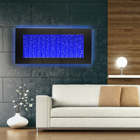 Bubble Fountain With Blue LED Lights In A Living Room Above A Couch