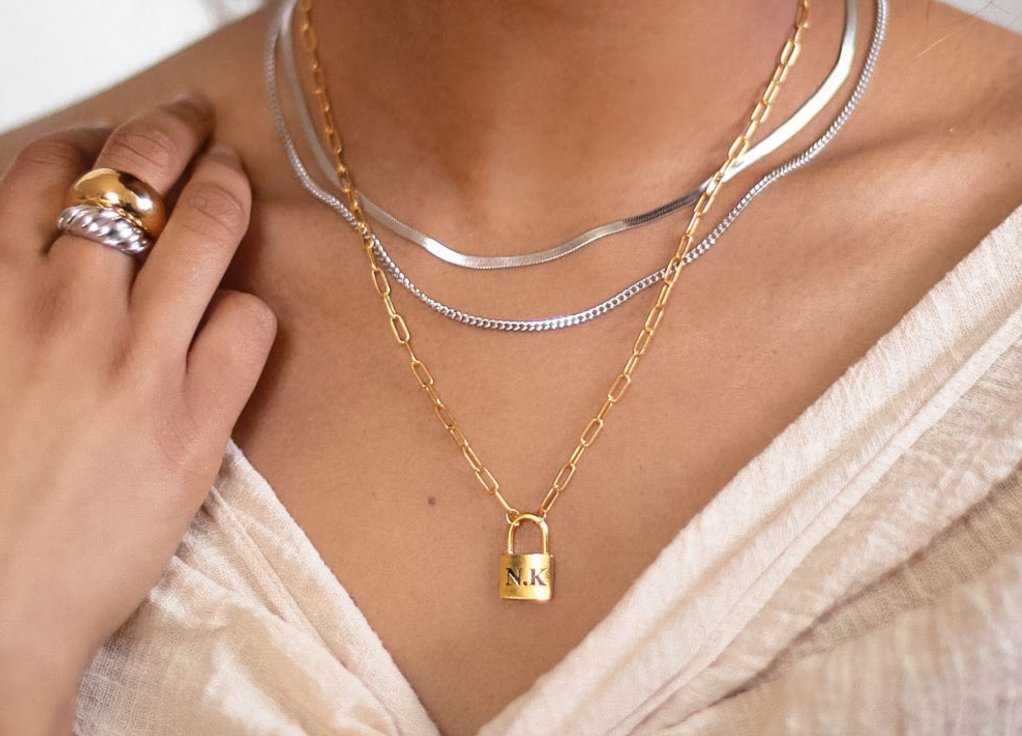 mixing metals, pairing silver with gold, silver and gold jewelry, mixing metals jewelry, silver layering necklace, gold layering necklace, sterling silver, 14k gold, layering necklaces, silver necklace stack, gold necklace stack, jewelry trends 2021, dainty necklace looks, everyday jewelry, jewelry pairing inspiration