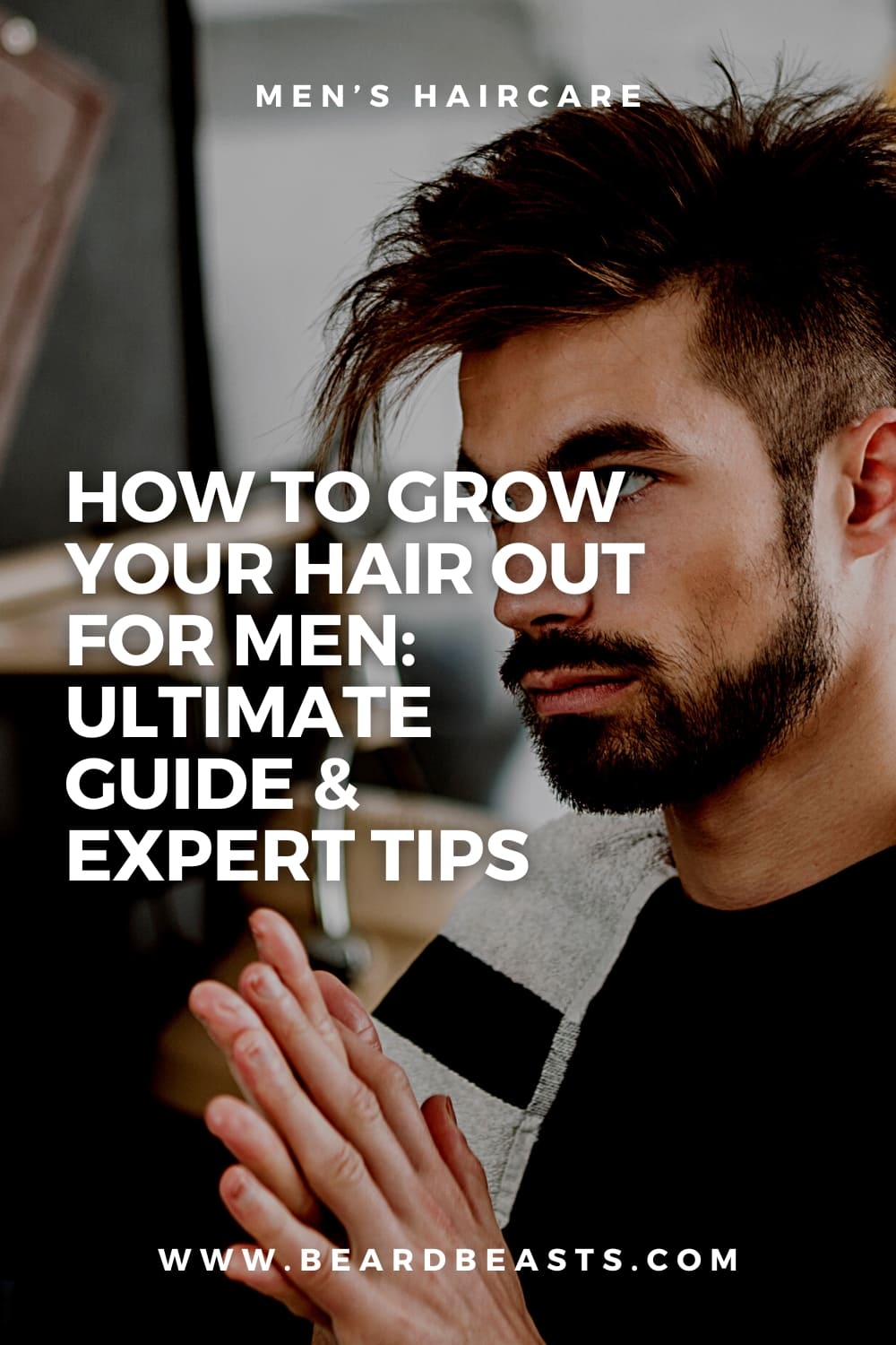 Man checking hair growth in mirror for article on How To Grow Your Hair Out For Men with Ultimate Guide & Expert Tips at BeardBeasts.com.