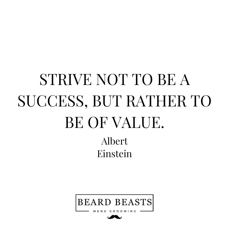 n image featuring a quote by Albert Einstein, "STRIVE NOT TO BE A SUCCESS, BUT RATHER TO BE OF VALUE," presented in a bold, elegant font centered on a white background.