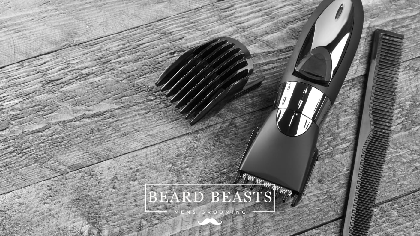 An image showing a set of hair clippers with attachments and a comb on a wooden surface, representing a guide on how to clean hair clippers.