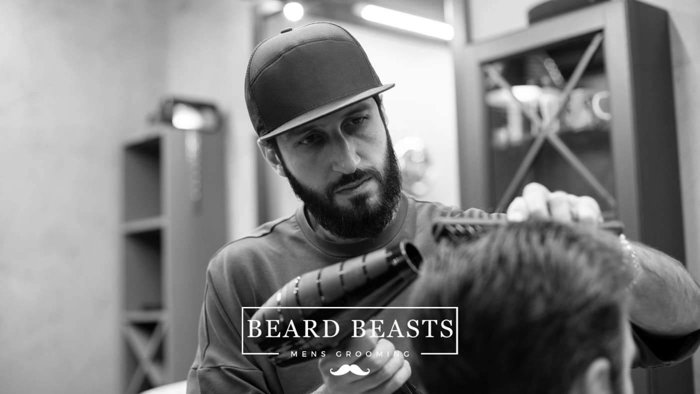 Barber in a cap providing a haircut and style to a client, answering the question, do barbers cut long hair.