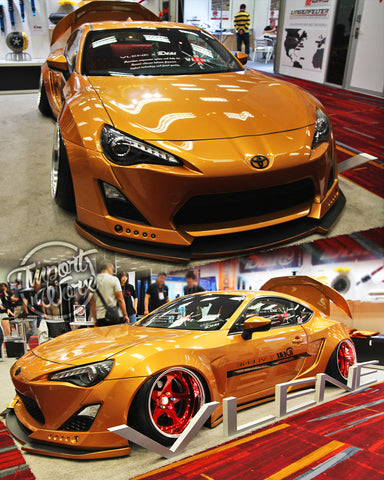 Sleek Vlene GT86 with widebody kit and red accents on display at SEMA 2018, featuring a supercharged engine and aerodynamic upgrades for improved performance and style.
