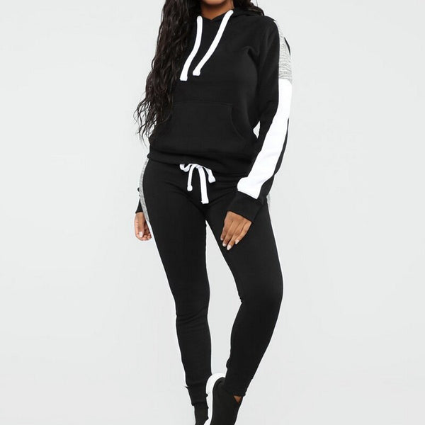 women's black track pants with white stripe