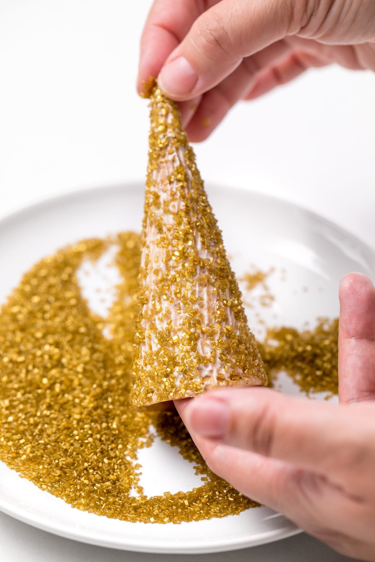 MAKE SURE THE ENTIRE CONE IS ENTIRELY COVERED WITH SPARKLING SUGAR