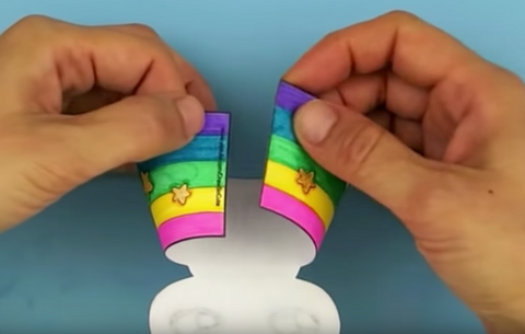 fold the unicorn paper back at both ends