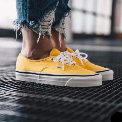 yellow vans on feet