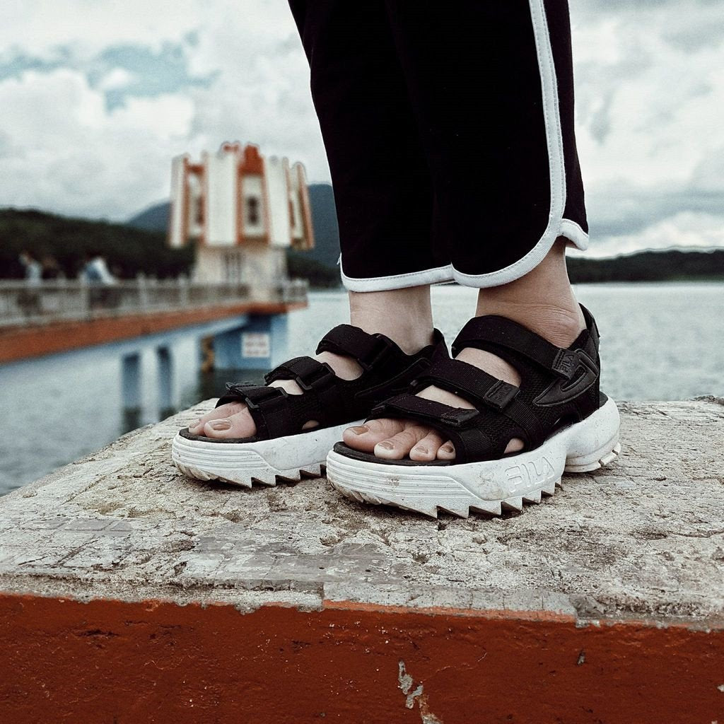 fila sandals on feet