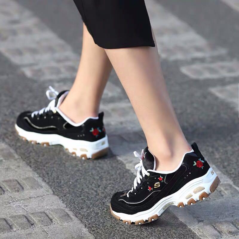 white skechers with roses