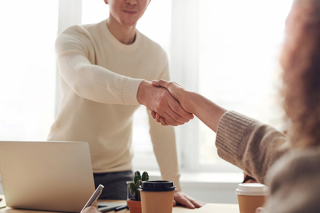 Shaking hands with a corporate client
