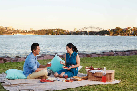 Couple enjoy a Pretty Green gift hamper at Cockatoo Island in Sydney