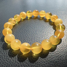 Load image into Gallery viewer, 10.3mm Genuine Baltic Amber Bracelet One of A Kind Jewelry | Lucky Stone of Aries Gemini Leo Virgo
