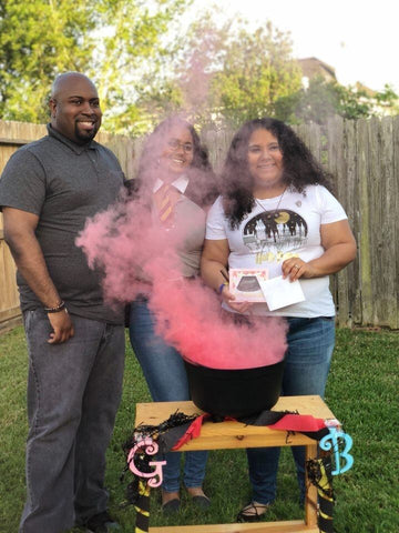  pink smoke bomb in cauldron 