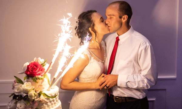 Cake and Bottle Top sparklers during cake cutting