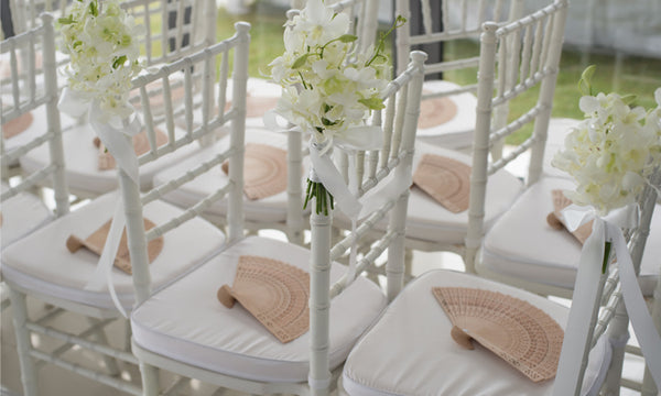 Keep Your Guests Cool with Fans during the wedding ceremony