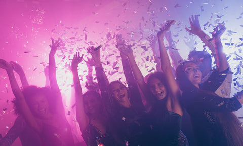 people at nightclub with confetti