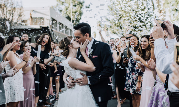 Wedding Kiss Under Confetti