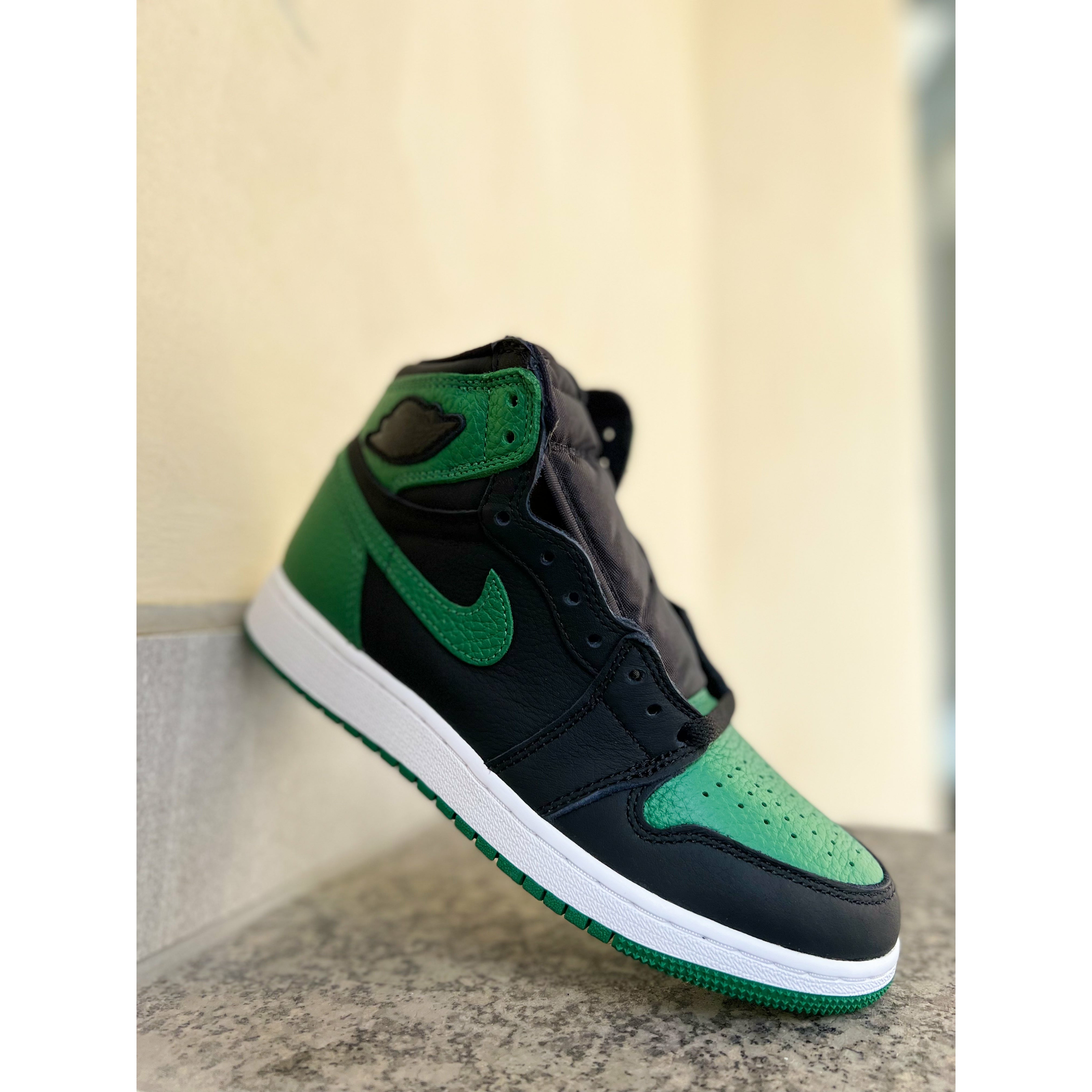 green and black jordan 1s