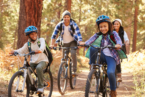 family riding bikes