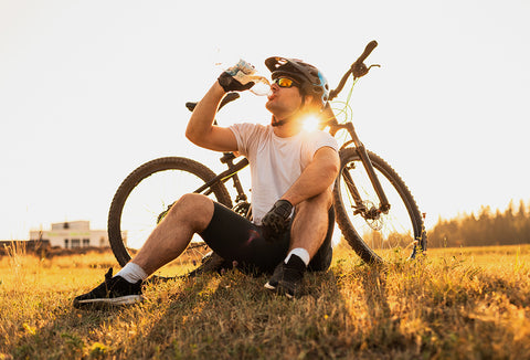 bicycle rider drinking water