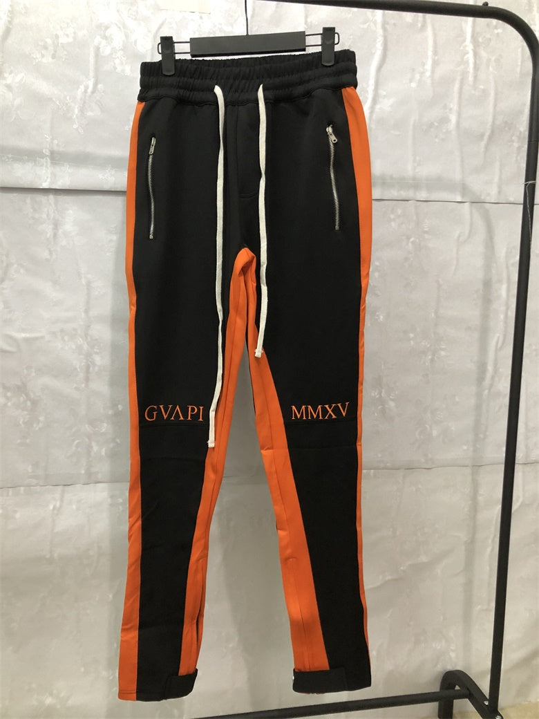 black pants with orange stripe