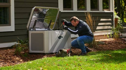 man working on off-grid generator maintenance