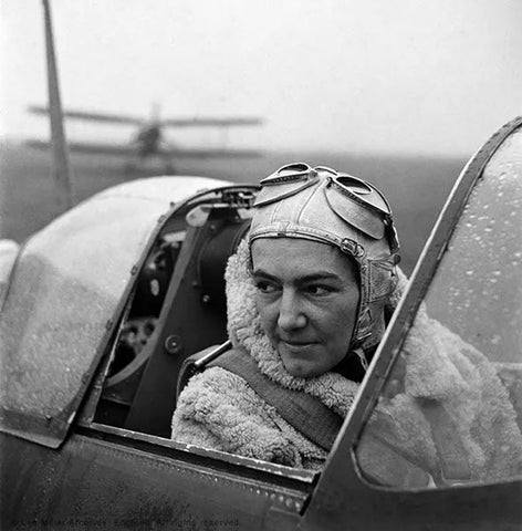 Anna Leska sitting in the cockpit of a Spitfire in Great Britain during WW II