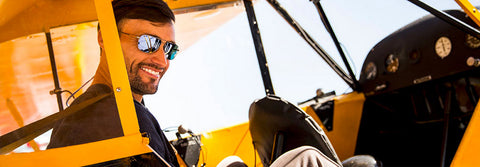 Pilot wearing Method Seven Aviator Sunglasses in Piper Cub Airplane