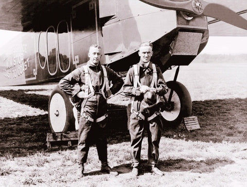 Lts. Macrady and Kelly standing in front of U.S. Army Air Service T-1 serial number A.S. 64233.