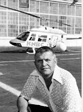 Gary Powers in front of the helicopter he flew for a television station.