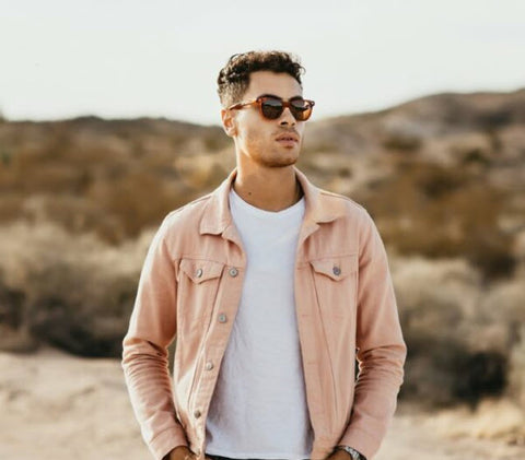 A man wearing a pair of American Optical AO Saratoga sunglasses