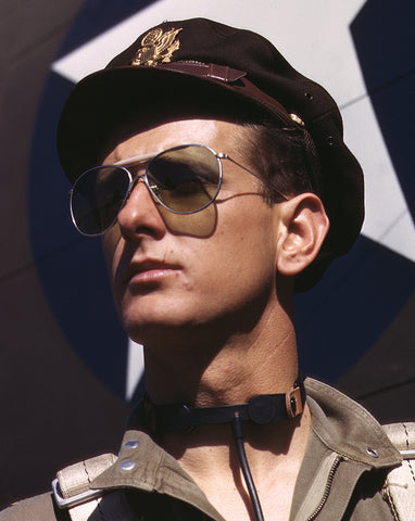 World War II pilot wearing tear drop shaped sunglasses.