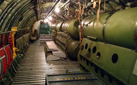 Palletized Fuel Tanks in the cargo hold of a KC-97 in-flight refueling tanker.