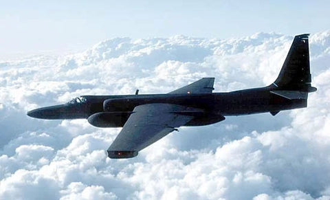 An image of a U-2 in flight over a heavy cloud layer.
