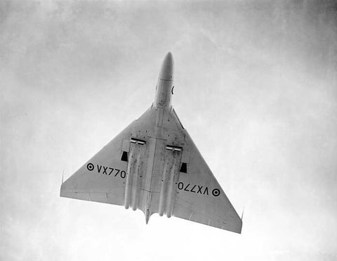 A photograph of Vulcan VX770 as it flies past the tower and begins a right turn.