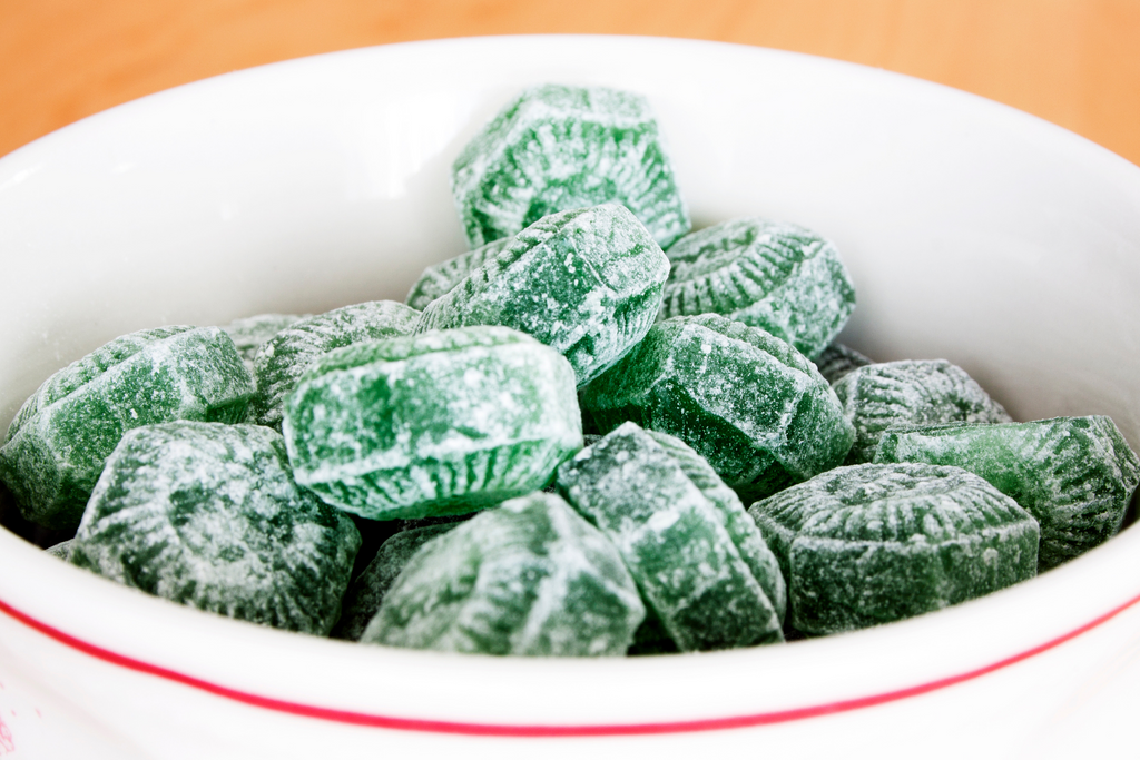 Mint or peppermint hard candies in a dish, cat dislike the scent of mint or peppermint or menthol