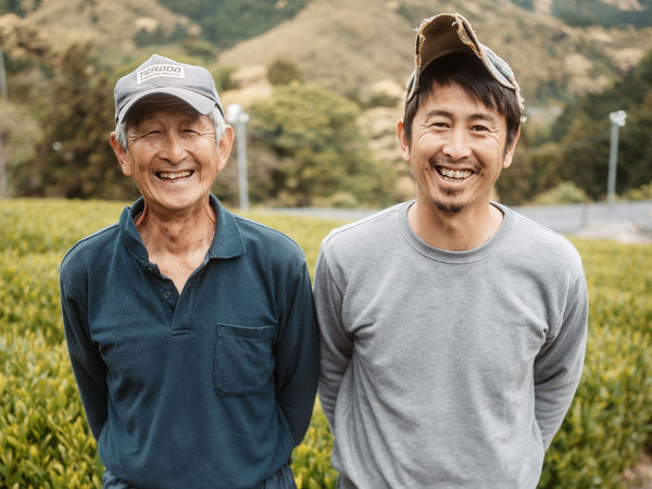 Iizuka-san and his father on the tea field