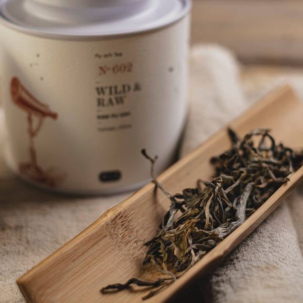 Pu-Erh Teeblätter mit Teedose